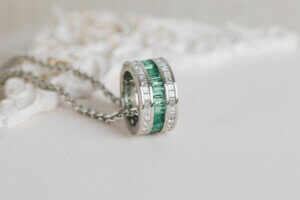 Channel set Emerald and Diamond Circle Pendant