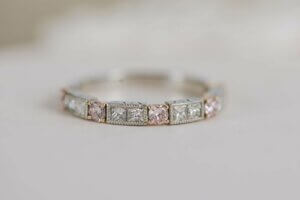 Natural Pink Diamond and White Diamond Rose Gold and Platinum Eternity Ring