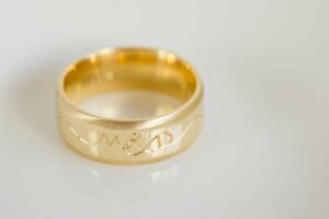 Gents Yellow Gold Bevelled and Engraved Wedding Ring