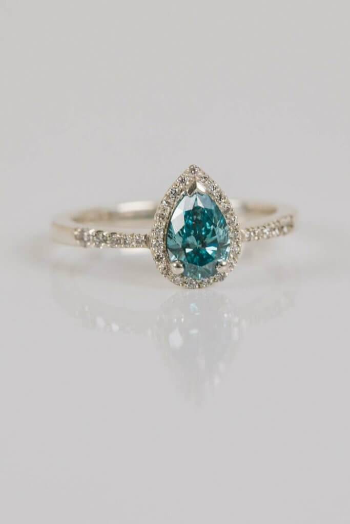 Blue Diamond Pear Halo Engagement Ring